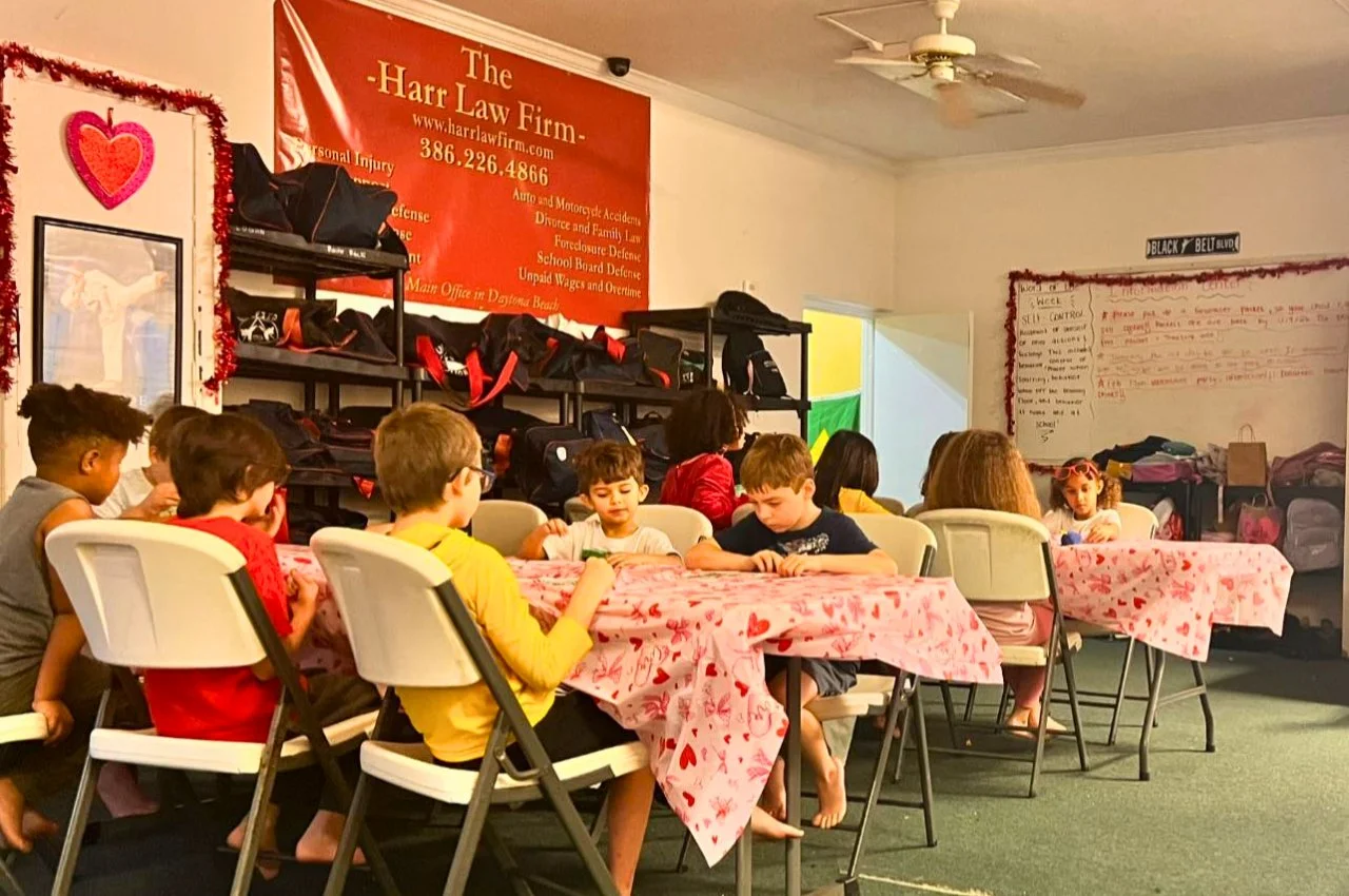 Kids in after-school martial arts at Emerald Rolling Academy